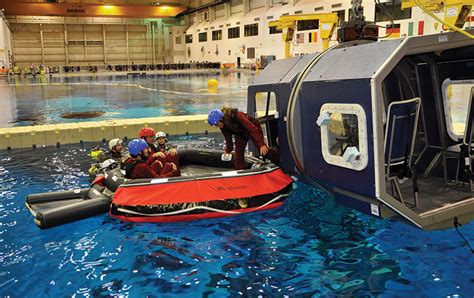 Offshore Oil Workers Learn Survival Skills in Astronaut Training Pool ...