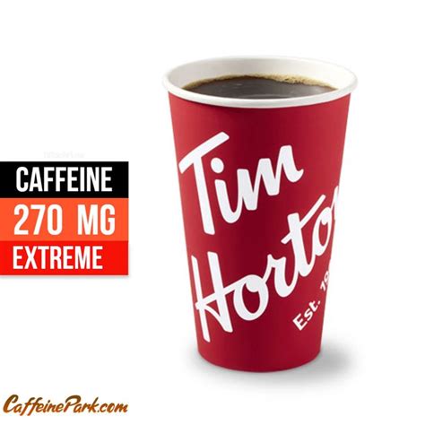 a red coffee cup with the words tim horton on it and an extra large ...