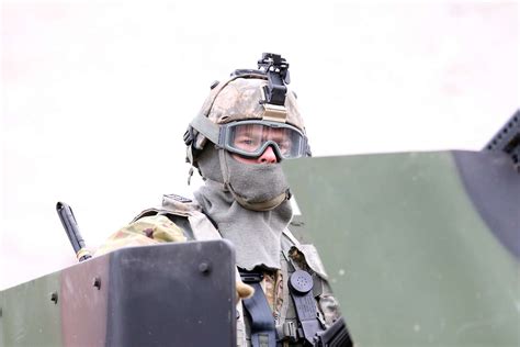 A U.S. Army Soldier mans the gunner’s turret of a humvee - NARA & DVIDS ...