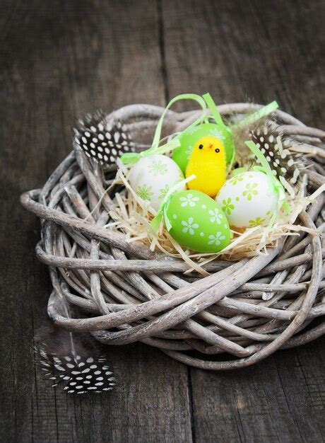 Premium Photo | Easter eggs in a nest