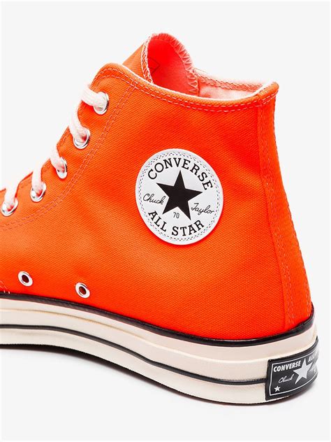 Converse bright orange Chuck 70 high top sneakers | Browns