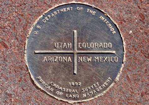 Standing on Four States at Four Corners Monument - The Gate