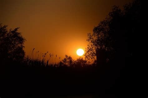 Premium Photo | Old lighthouse silhouette at sunset in sulinaromania