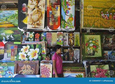 UBUD, INDONESIA, May 2016, Woman at Paintings Shop in Ubud Market the ...