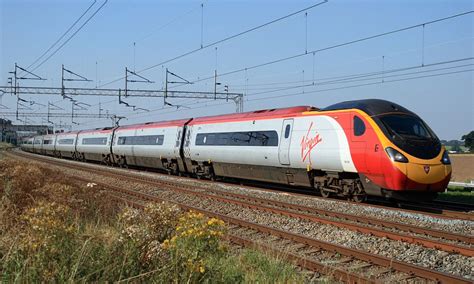 Virgin Pendolino train manager told passengers 'sit on floor we're ...