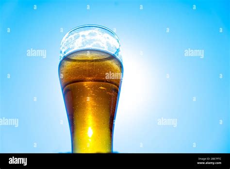 Tall glass with beer. A pint of beer Stock Photo - Alamy