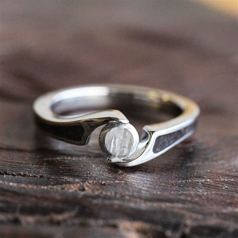 Wear the most unique ring on your finger with this meteorite engagement ...