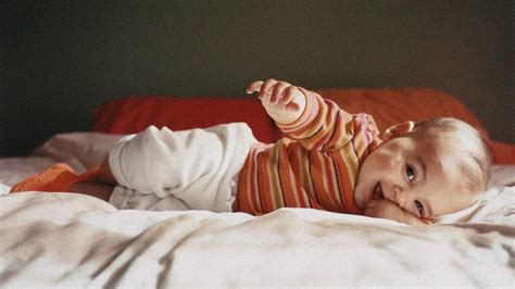 Baby rolling over in sleep: When is too early and what to do