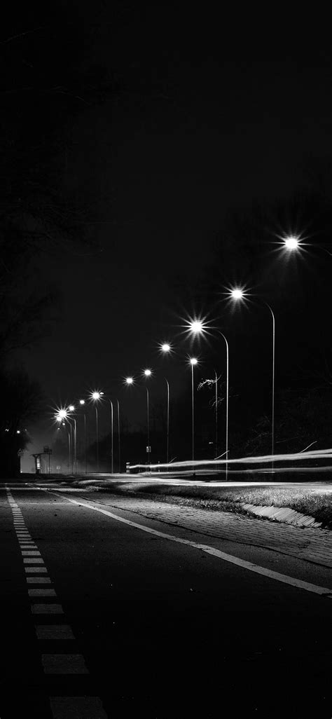 mx29-street-lights-dark-night-car-city-bw-wallpaper