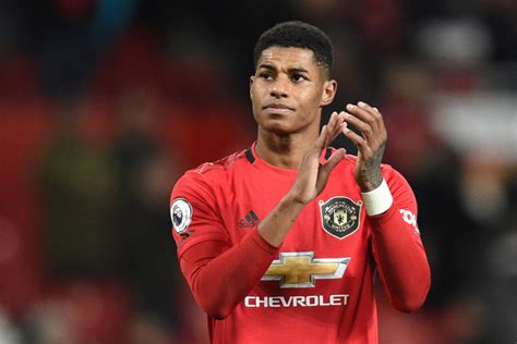 Soccer star Marcus Rashford forces British government U-turn on free ...