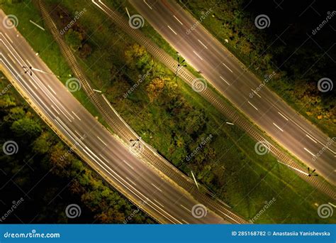 Top Down View To Road. Romantic Night Aerial Photo of Cars Traveling ...