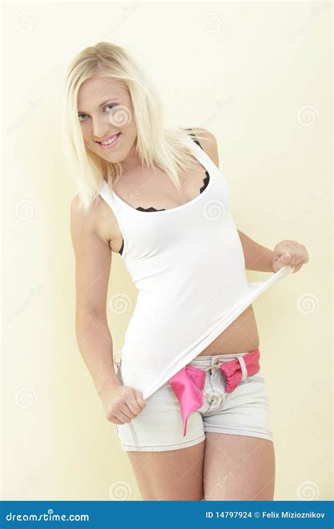 Woman Removing Her Clothes Stock Images - Image: 14797924