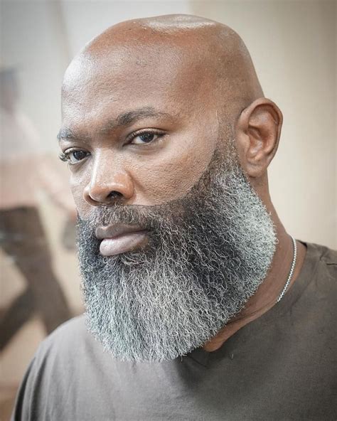 red hair in beard black man - Tobi Corley