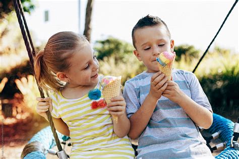 "Kids Eating Ice Cream In Park" by Stocksy Contributor "IMAGE SUPPLY ...