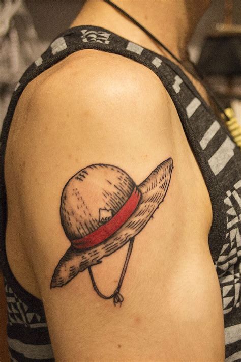 Amazing tattoo arm Luffy's hat Ace's vivrecard | Pieces tattoo, One ...