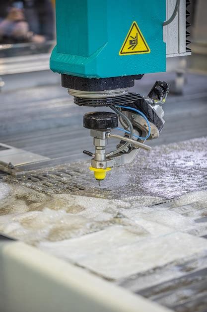 Premium Photo | Cnc water jet cutting machine