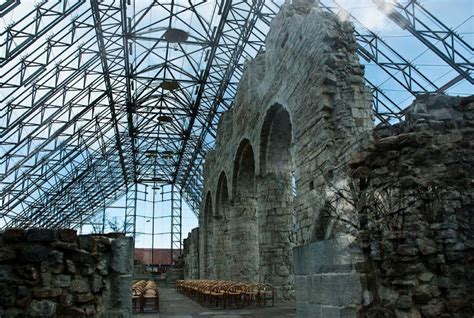 Hamar Cathedral, a beautiful church ruin completely covered in glass ...