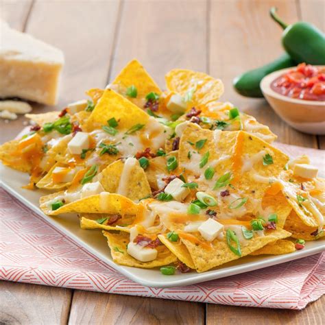 Tostitos - Ultimate Four Cheese Nachos | Recipe | Creamy spinach dip ...