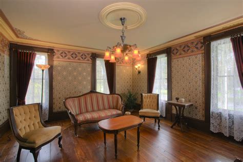 A 1850s Victorian parlor across the center hall from the Federal parlor ...