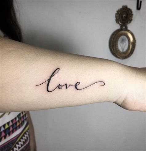 Cursive love tattoo by Fin Tattoos | Word tattoos, Tattoo word fonts ...