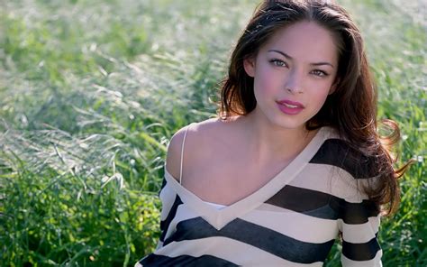 Kristin Kreuk sitting in the grass wallpaper - Celebrity wallpapers ...