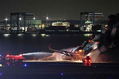 JAL passengers escape blaze after collision at Tokyo airport | Inquirer ...