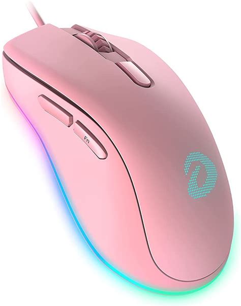 a pink computer mouse with blue and green lights on it's side, in front ...