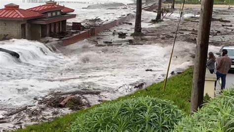 Massive waves flood Santa Cruz as storm surges across California coast