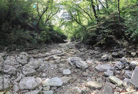 The Agura river and the Agura waterfalls which is completely dry for ...