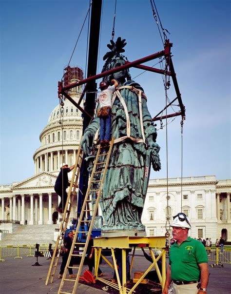 In 1993, Thomas Crawford's Statue of Freedom was removed by helicopter ...