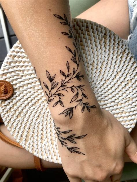 Wraparound vines in 2020 | Wrap around wrist tattoos, Wrap around ...