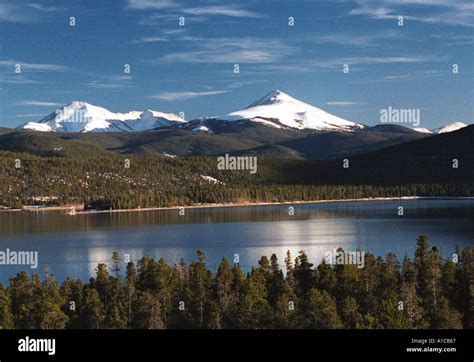 Lake and Snow Capped Mountains In Colorado Stock Photo - Alamy