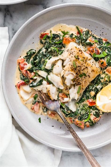 Baked Fish With White Sauce And Spinach - Unique Fish Photo