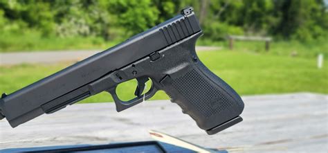 GLOCK 40 MOS Gen 4 10mm Semi Auto Pistol, 6.02" Barrel 15 Rounds ...