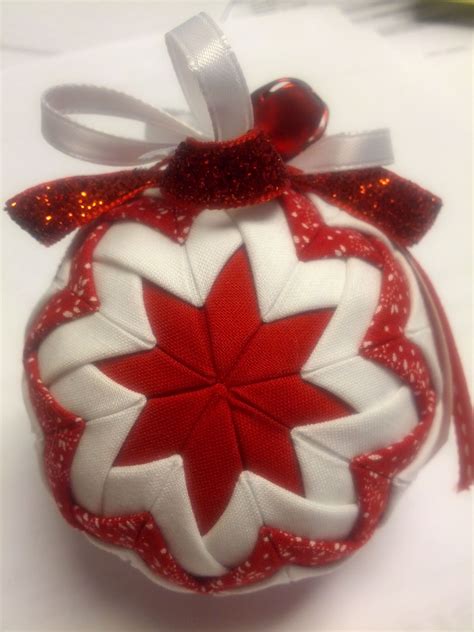 DIY ornament made out of foam ball, fabric, straight pins & ribbon ...