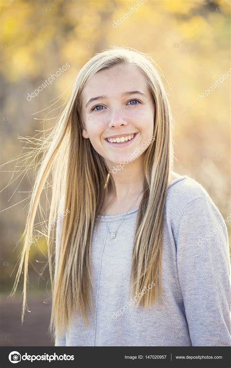 Beautiful Portrait of smiling teen girl outdoors Stock Photo by ...