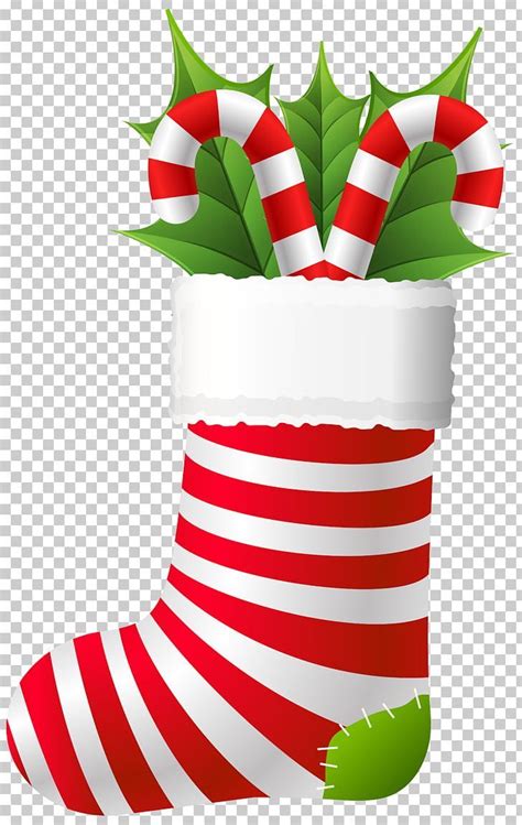 a christmas stocking with red and white stripes, holly leaves and candy ...