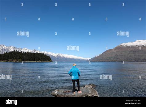 Lake Wakatipu, Queenstown , New Zealand. Tourists enjoy activities on ...