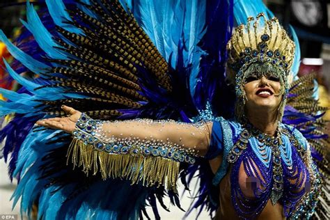 A samba dancer takes part in a parade at Anhembi Sambadrome as part of ...