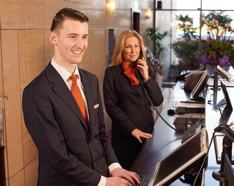 Receptionist Uniforms UK & Ireland – Receptionist and front desk ...