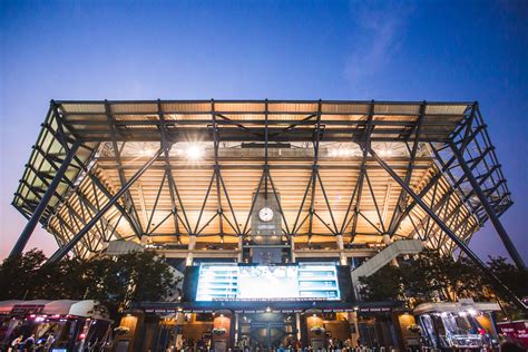 A view of Arthur Ashe Stadium from the outside. | Building, Stadium ...