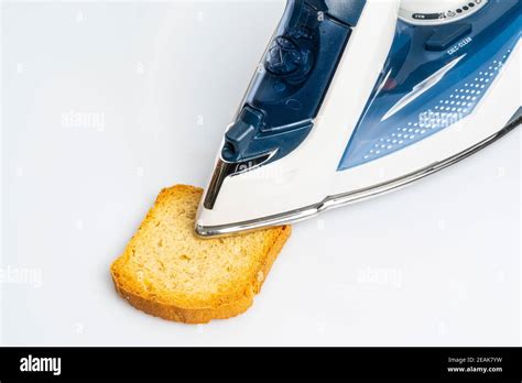 toast a slice of bread Stock Photo - Alamy