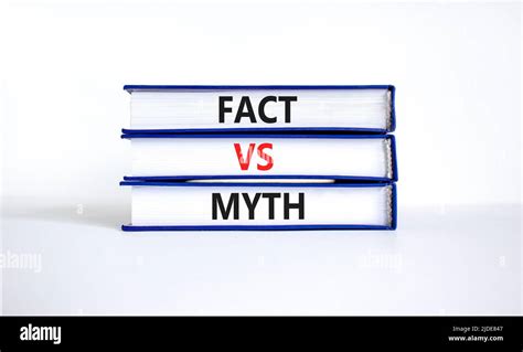 Fact vs myth symbol. Concept words Fact vs myth on books on a beautiful ...