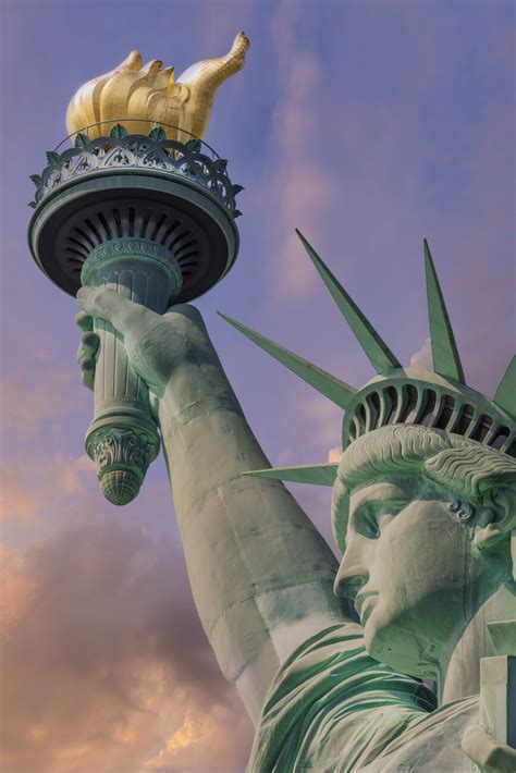 Statue Of Liberty At Sunset