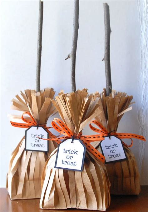 three bags with tags tied to them sitting on a table