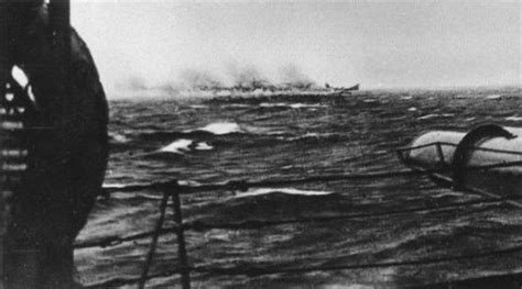 The Bismarck about to capsize sinking by the stern as seen from the ...