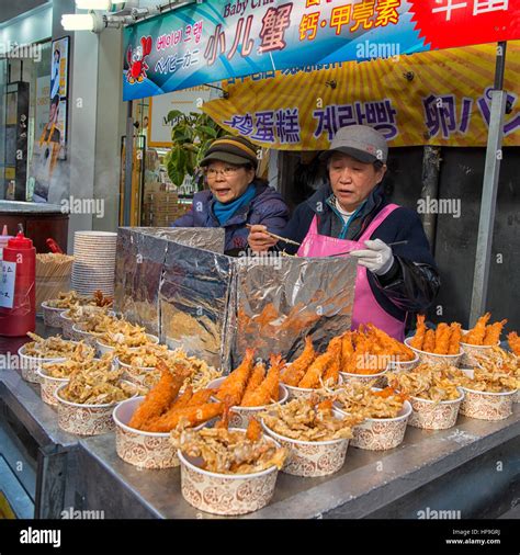 Street Food at Myeongdong Market in Seoul, South Korea Stock Photo ...