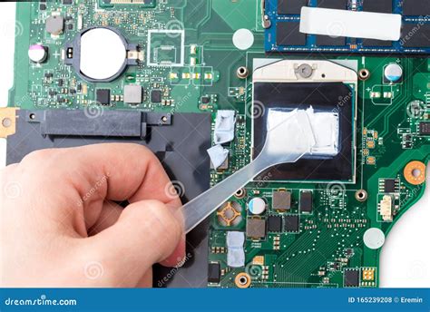 Replacing Thermal Paste on a Laptop. Stock Photo - Image of engineer ...