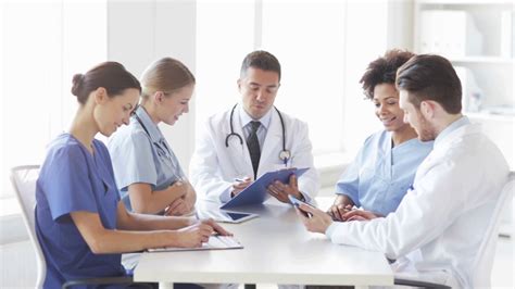 group of happy doctors meeting at hospital office Stock Video Footage ...