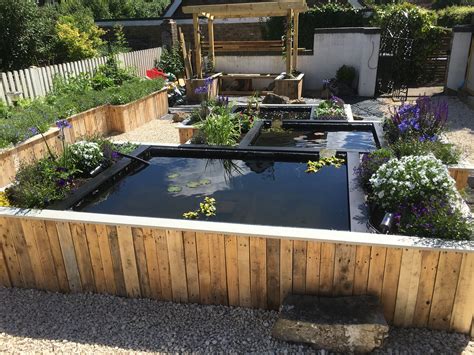 Raised ponds - clad with pallet timber. | Raised ponds | Pinterest ...